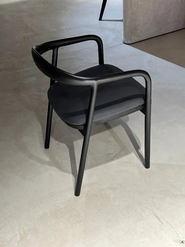 Black wooden chair in a showroom