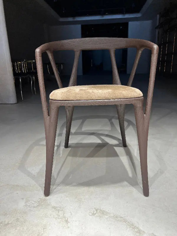 Walnut wood chairs in dark coffee color with natural leather