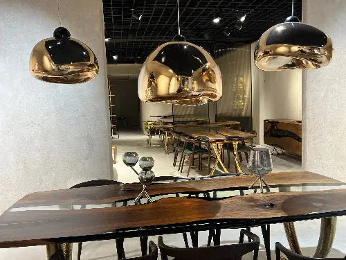 cement & stone looking pendant light and chandeliers in gold