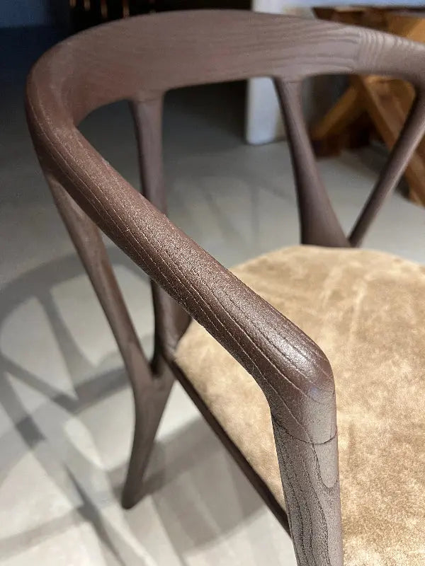detailed look at wooden part of walnut chairs