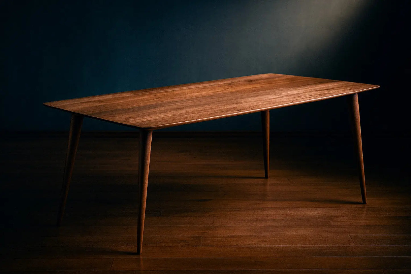 Wooden table in a dark room with a spotlight