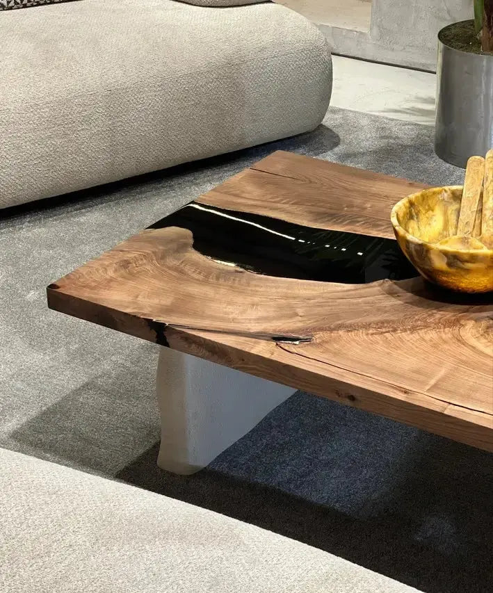epoxy resin coffee table with cement inspired legs