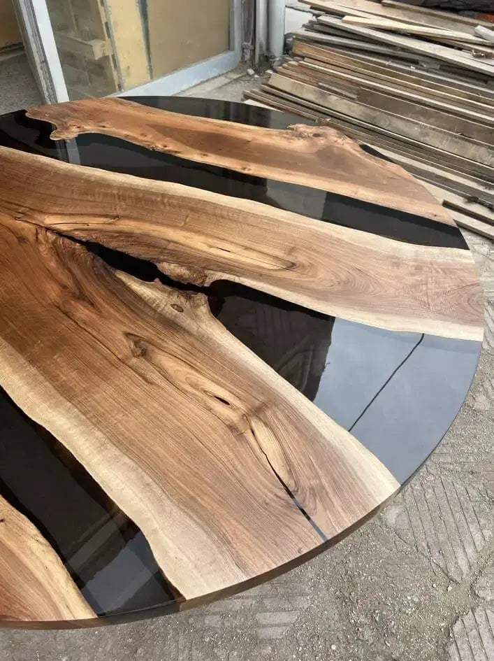 round walnut table with wooden tulip base made of walnut