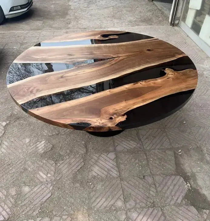 round resin table with tulip base made of walnut