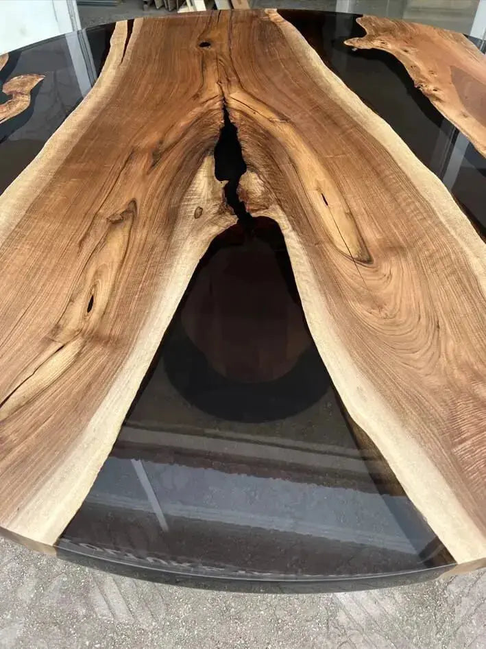 round resin kitchen table with wooden tulip base made of walnut