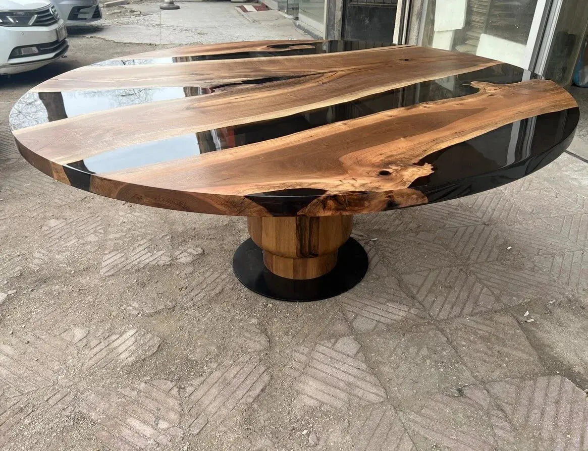 round walnut table with wooden tulip base made of walnut