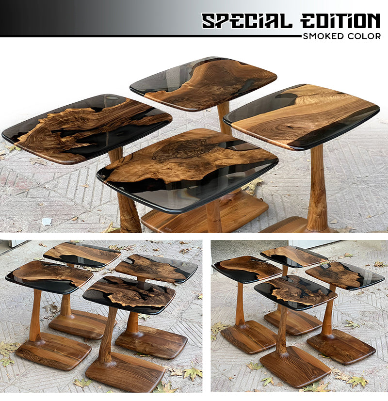 Set of wooden tables with a smoked color finish on a textured surface.