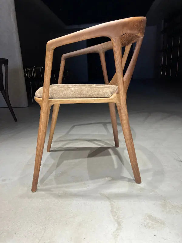 walnut wood chairs with natural leather left view