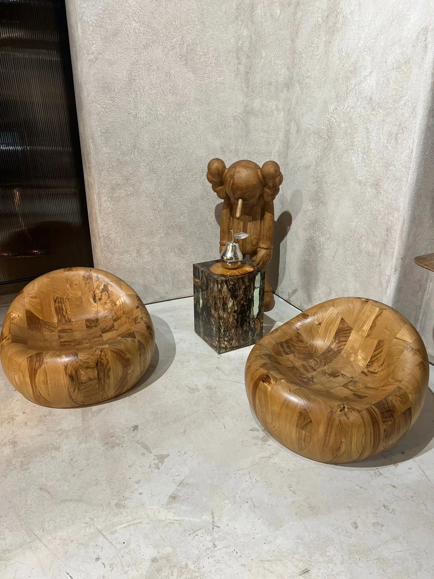 walnut wooden pod chair and kaws handcrafted decor XX