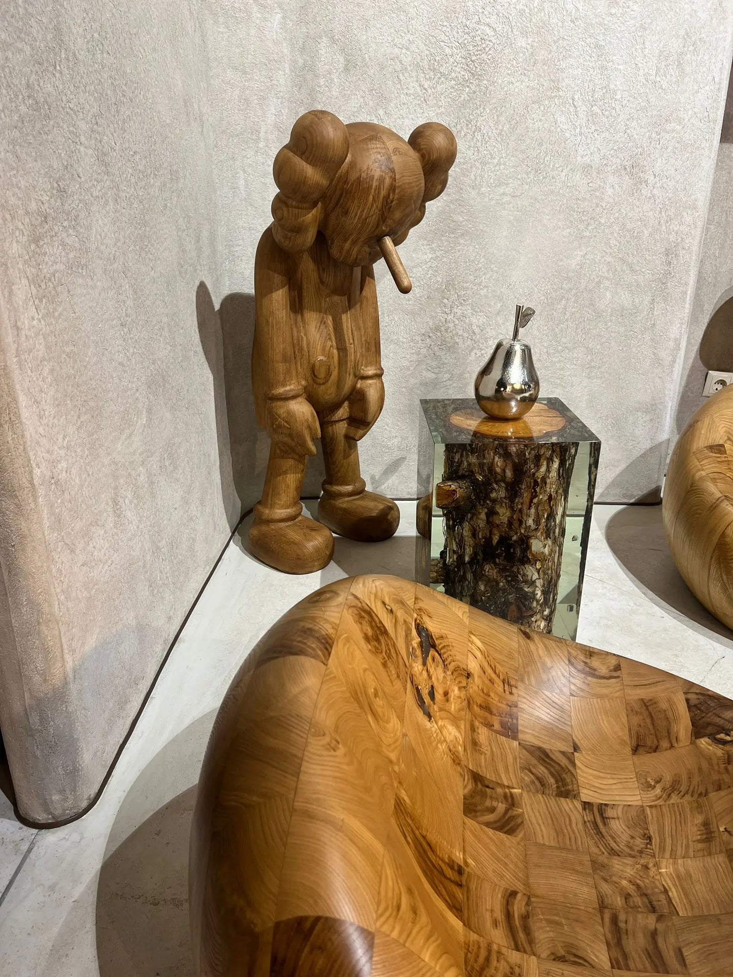 wooden pod chair and kaws walnut