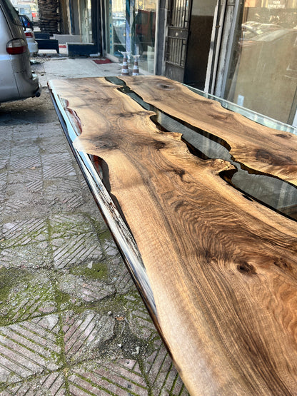 clear resin walnut dining table with brown walnut leg detailed