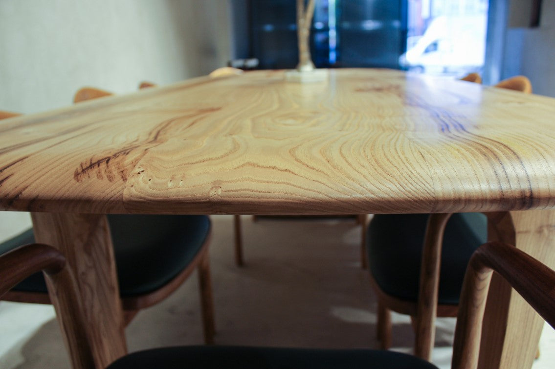 detailed look at rustic chestnut table top