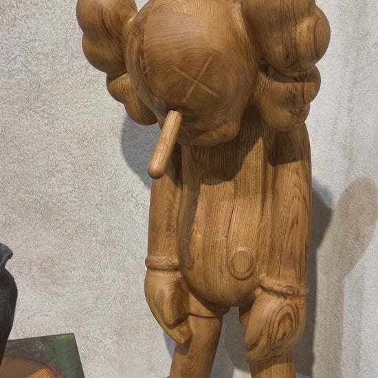 wooden kaws figure Companion